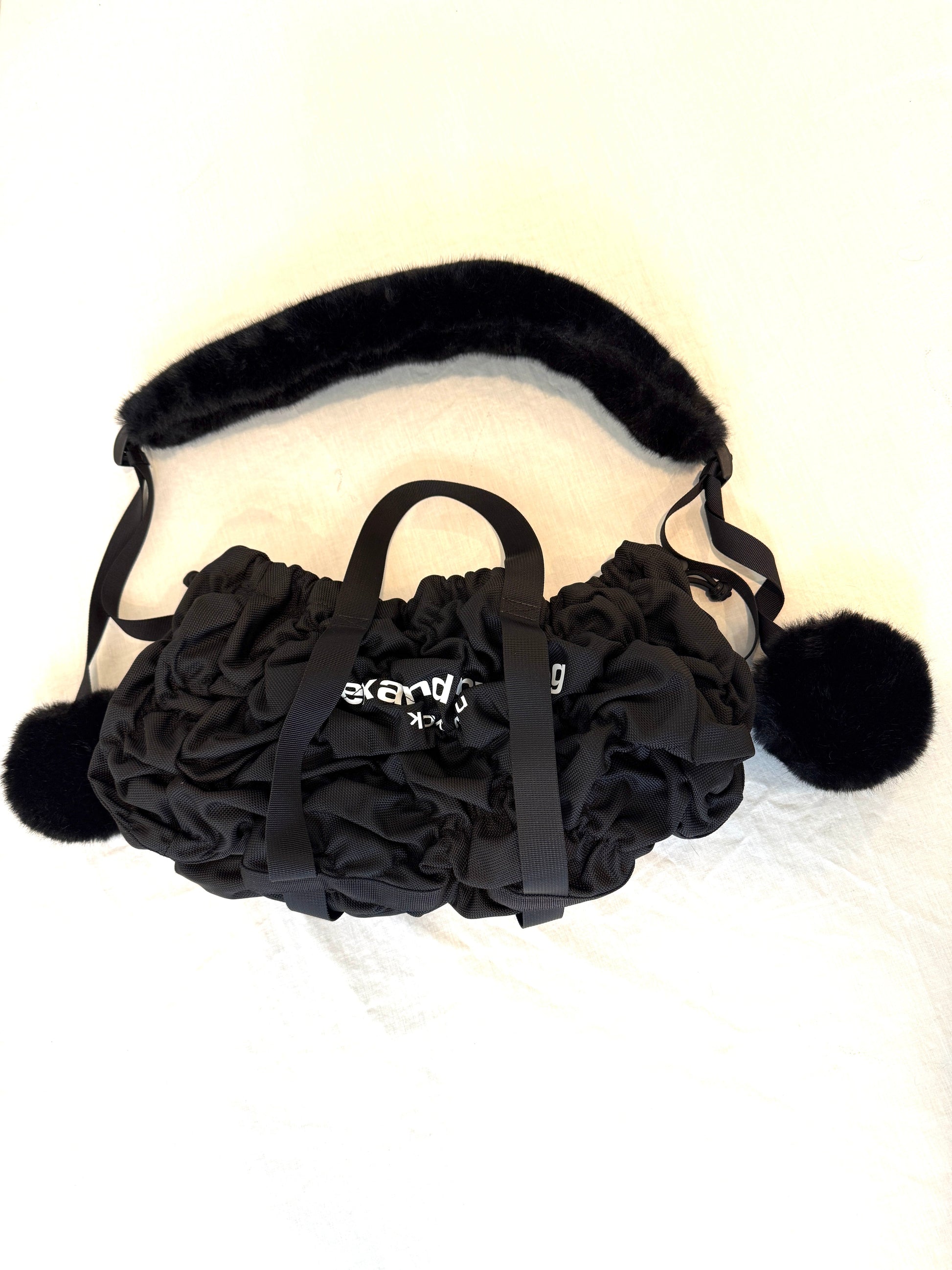 Alexander Wang Scrunchie Bag with fur shoulder strap, expandable design, and decorative fur balls. Brand new, never used.