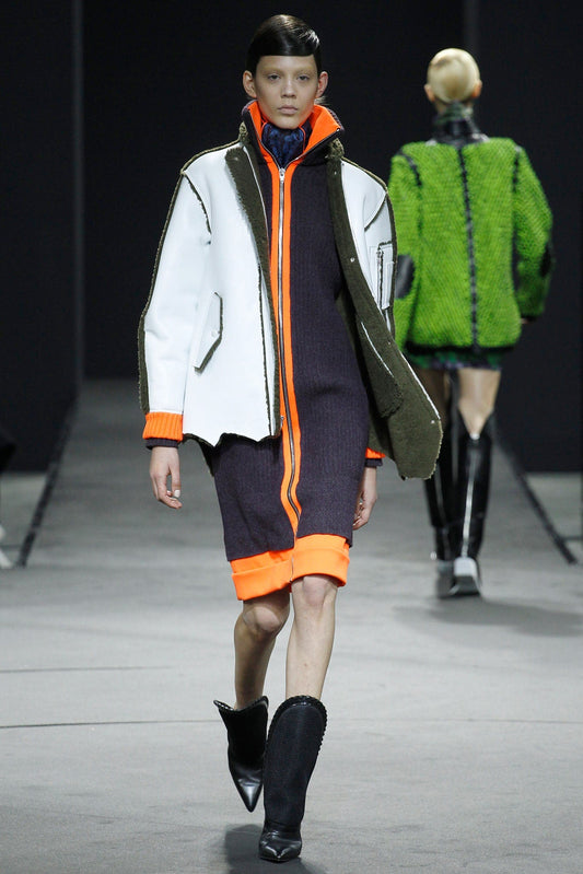 Alexander Wang White Silica Jacket in deerskin and lamb shearling with unhemmed bottom and orange cuffs, from Fall 2014 Collection.