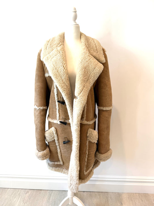 YSL Men’s Shearling Jacket from the 2006 Winter Collection, crafted from 100% Vero Shearling for warmth and timeless style.